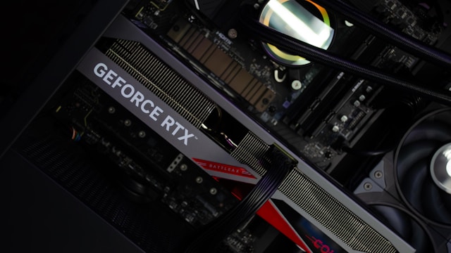 RTX 5080: Specs, Price, Performance, and Is It Worth Buying in 2026? NVIDIA GeForce RTX 5080 graphics card inside a high-performance gaming PC